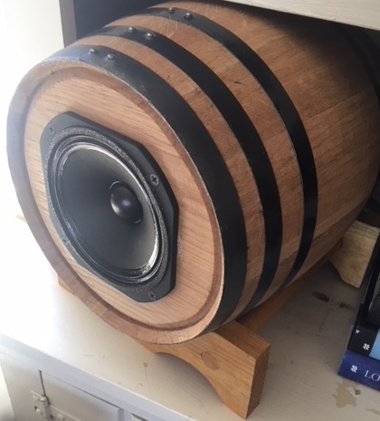 full range speakers in beer barrels side view